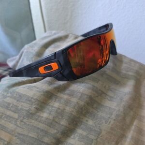 Oakley Black Frame with Red-Orange Lenses Sunglasses